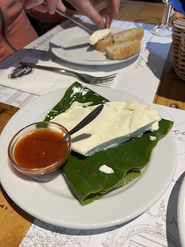 Local cheese with red pepper sauce at Tasca's